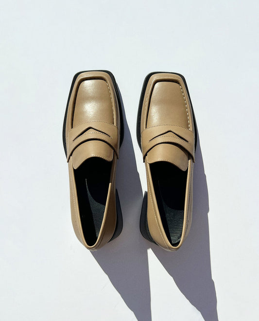 Mocassin noir moderne à talon pour homme